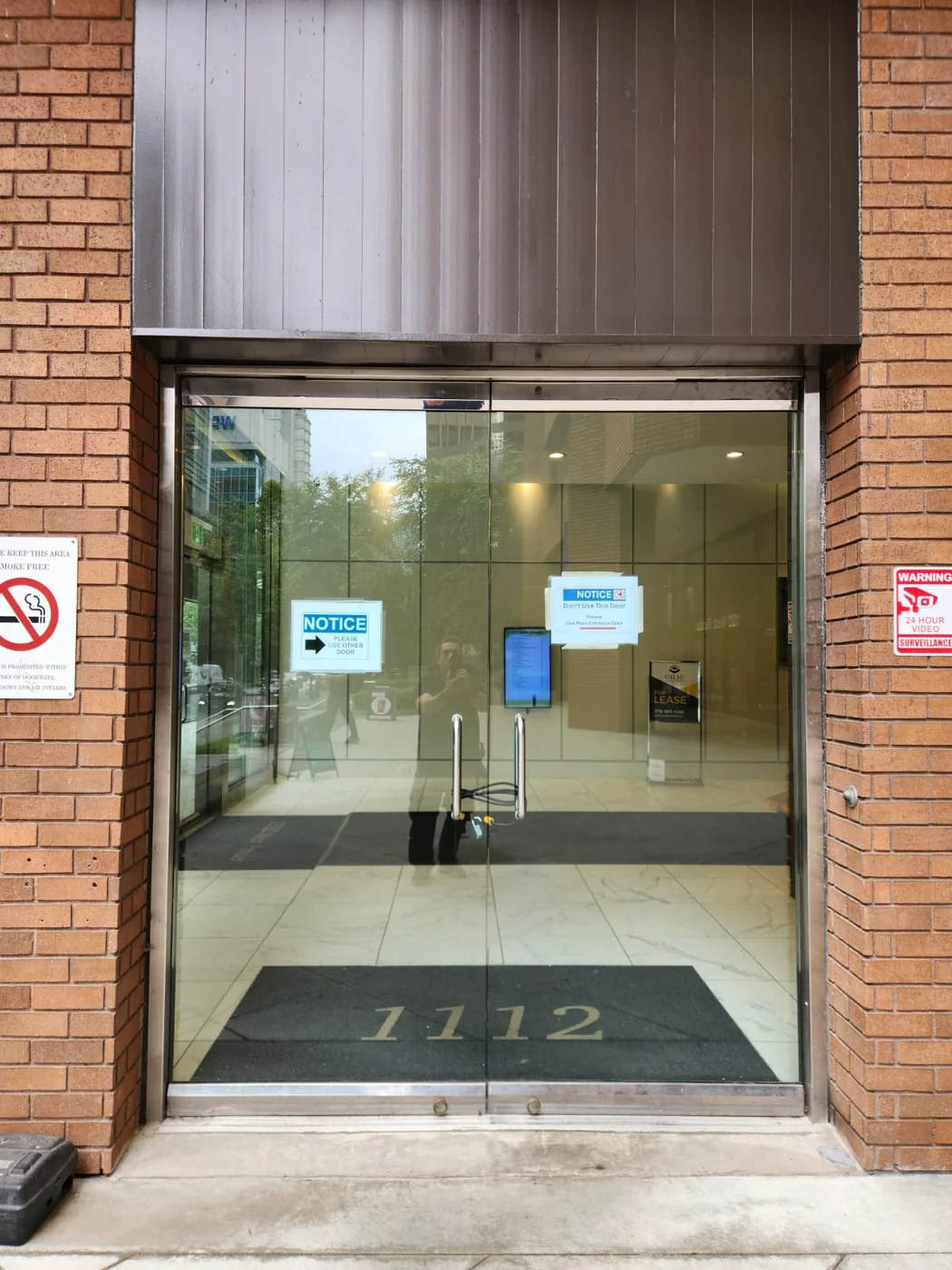 Commercial storefront glass entrance doors serviced by A+ Doors Inc in Vancouver